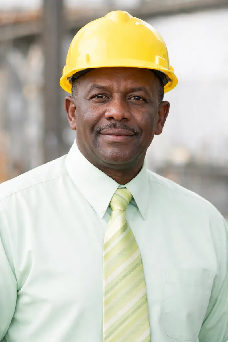 Portrait of Harold Ruan wearing a hard hat