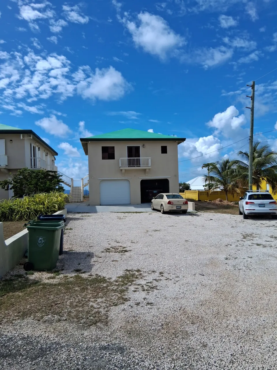 Two-storey private residence with integrated garage and balcony in East End, Anguilla